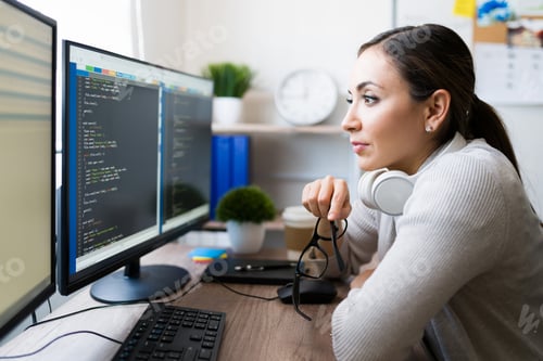 Preview: Beautiful programmer checking her code