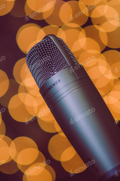 Preview: Condenser microphone against a background of blurred lights