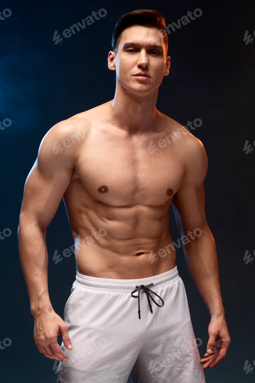 Preview: Portrait with copy space of attractive stunning man demonstrating muscular naked torso