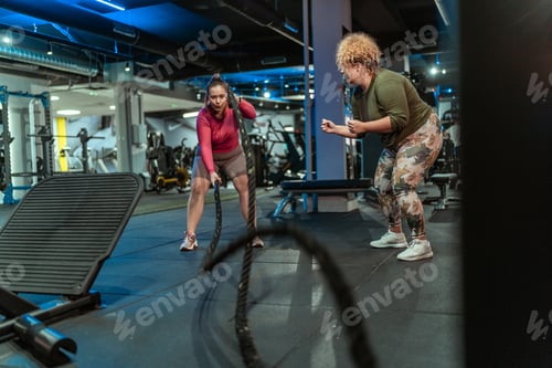 Preview: Two plus-size women embrace their bodies as they engage in a challenging workout.