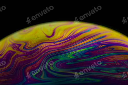 Preview: Closeup shot of the beautifully painted eggshell by a black background