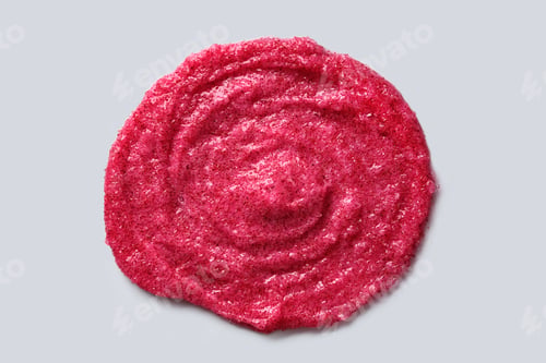 Preview: Circular Smear of Exfoliating Scrub with berry and sugar. Close-up.