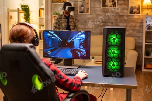 Preview: Professional video gamer female playing an online shooter game