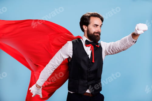 Preview: Determined adult posing as superhero