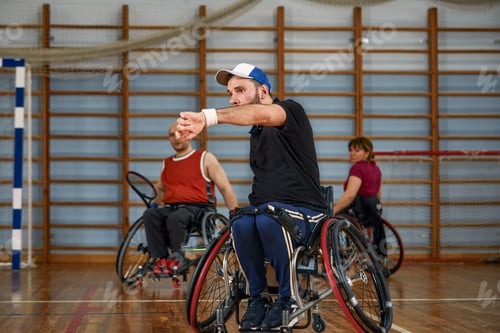 Preview: People in wheelchair playing tennis on court. Wheel Chair Tennis For Disabled.