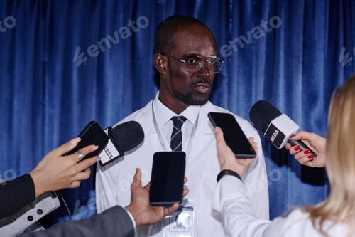 Preview: Doctor giving an interview to journalists