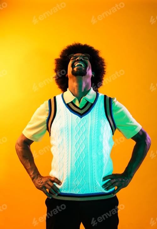 Preview: African man portrait in studio on colorful background