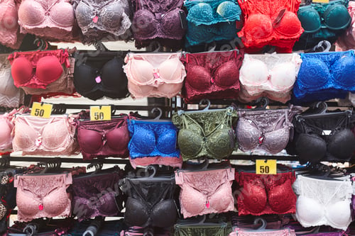 Preview: Colored bras on a street market. Fashionable womanswear. Woman underwear