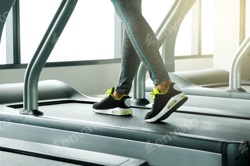 Preview: Closeup of female legs on the treadmill