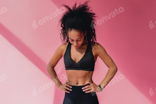 Preview: Athletic Woman in Active Wear Posing Indoors