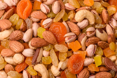 Preview: A mix of nuts and dried fruits as ingredients for a healthy meal. Nuts and dried fruits
