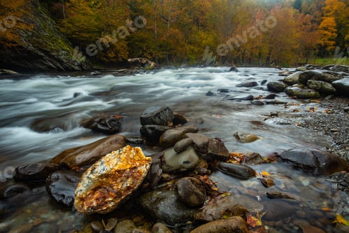 Preview: A Perfectly Placed Quartz Rock In The Little River In Smoky Mountains National Park In Fall