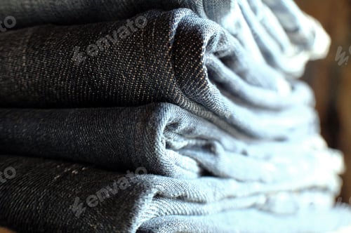Preview: A stack of folded jeans