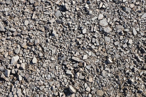 Preview: Background of shattered stony stones surface in mountain area. Texture with natural light