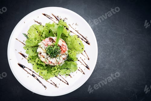 Preview: Delicious Salad on White Plate with Dark Background