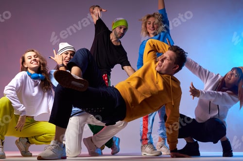Preview: Active group of dancers in dance hall