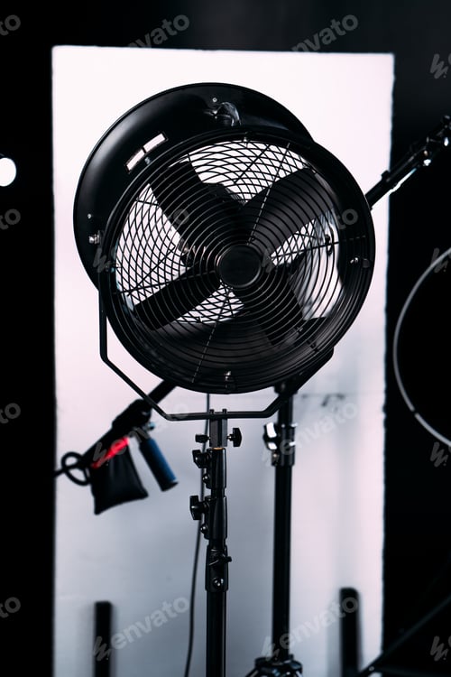 Preview: Modern photo studio with professional equipment. Black cyclorama.
