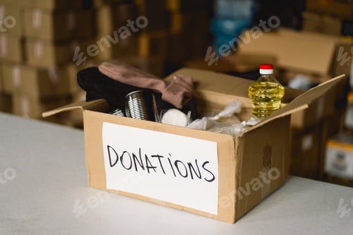 Preview: Donation food and cloting for refugees, support of war victims, helping people, charity.