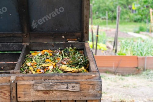 Preview: Composter in a community garden with copy space