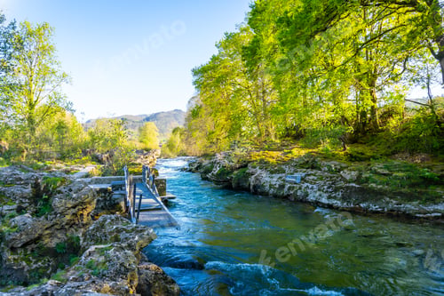Preview: Path near the river Sella in the town of Cangas de Onis. Asturias. Spain