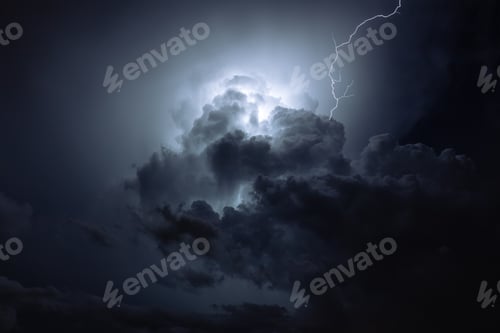Preview: Lightning in the evening at sunset in the stormy sky