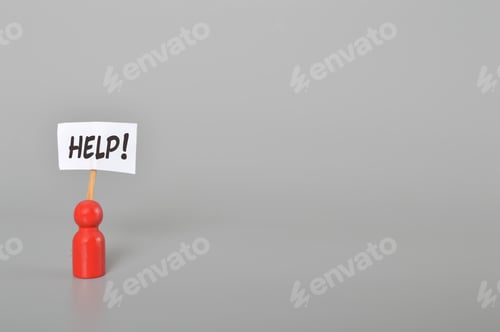 Preview: Red wooden figure of people with text HELP!