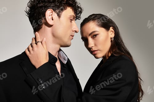 Preview: Fashionable Man and Woman in Black