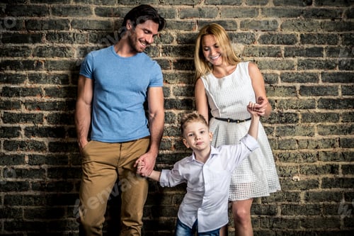 Preview: Family home portrait. Parents and son spending time together