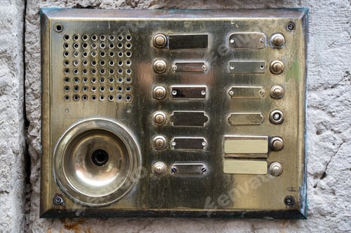Preview: Vintage brass intercom panel with textured surface