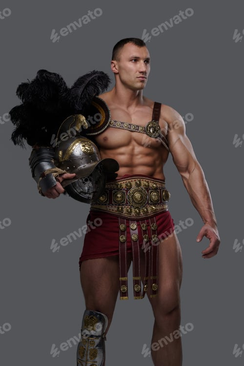 Preview: Gladiator with muscular build holding helmet against gray background