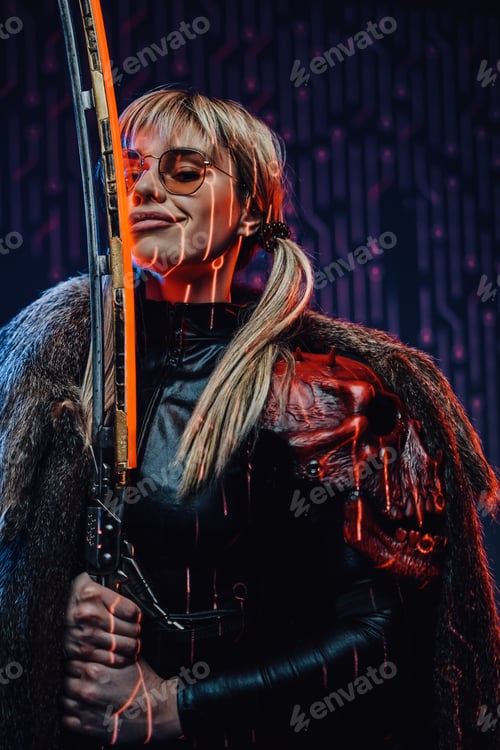 Preview: Joyful woman with sword wearing sunglasses and fur