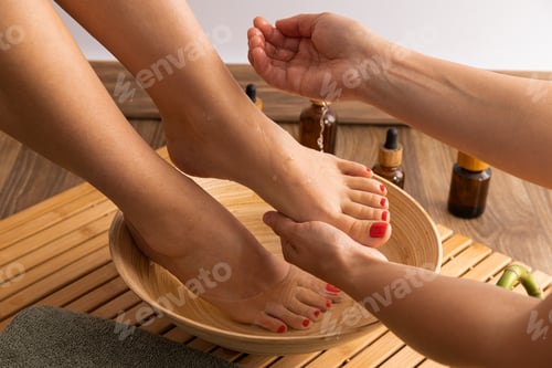 Preview: Concept of legs spa and care with beautiful young woman legs