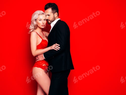 Preview: Beautiful woman and handsome man in studio