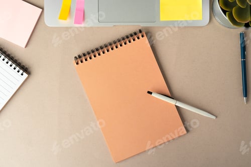 Preview: Open laptop with blank notebook, view from above. Workplace concept