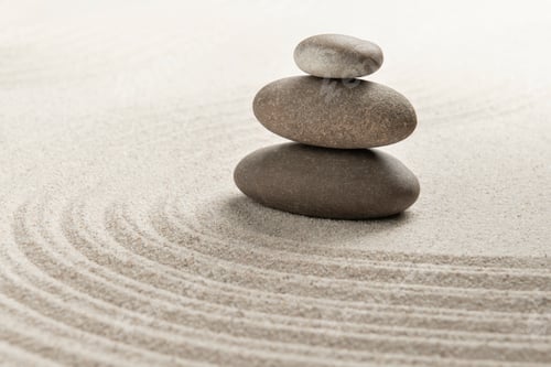Preview: Stacked zen stones sand background art of balance concept