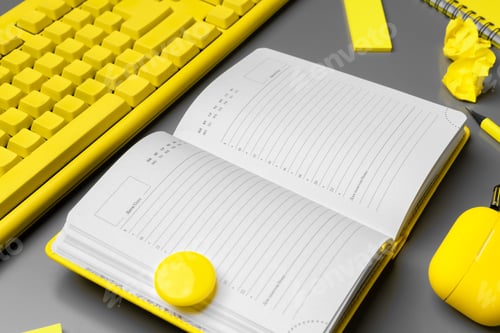 Preview: Open yellow notepad and keyboard on gray background