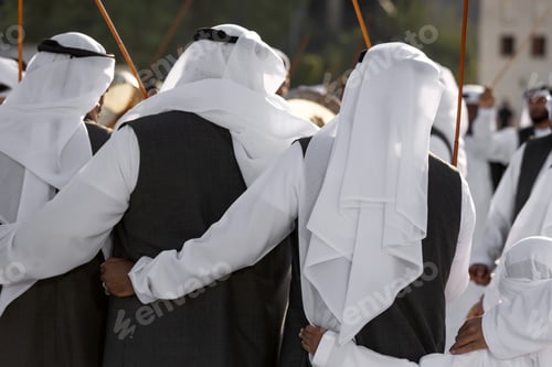 Preview: Traditional Emirati Al Ayalah male dance, UAE heritage, people from behind