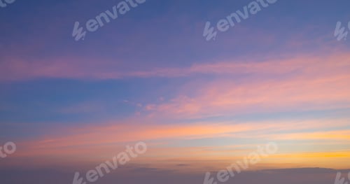 Preview: Sunset sky. Abstract nature background. Dramatic blue and orange, colorful clouds at twilight time.