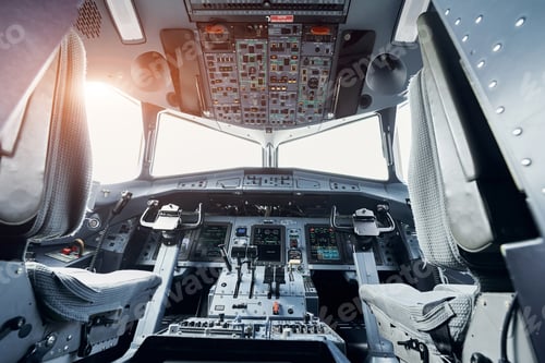 Preview: Beautiful sunlight. Close up focused view of airplane cockpit