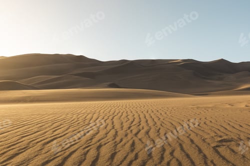Preview: Colorado Great Sand dunes at a bright sunset evening