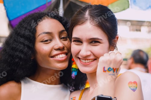 Preview: A lesbian couple representing the symbol of homosexuality in a pride parade.