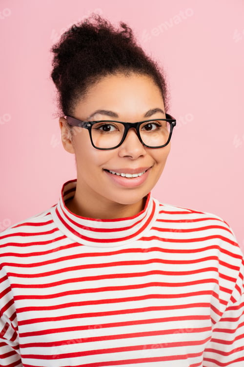 Preview: Portrait of smiling successful African American woman wearing casual sweater and stylish eyeglasses