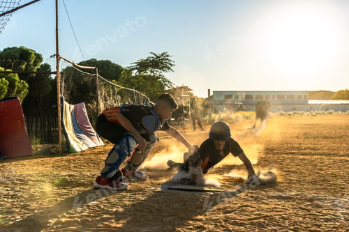 Preview: Kids playing baseball, runner sliding into base