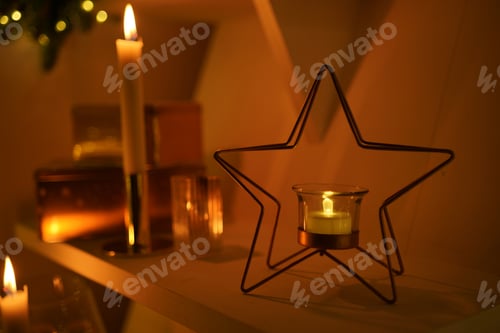 Preview: New Year 2022. interior with candles, bulbs and bokeh. Room decorated to celebration. Christmas tree