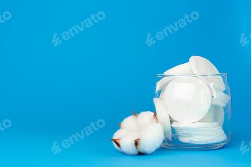 Preview: Cotton discs for skincare in a jar on paper background