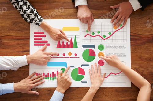 Preview: Business people analyzing many charts