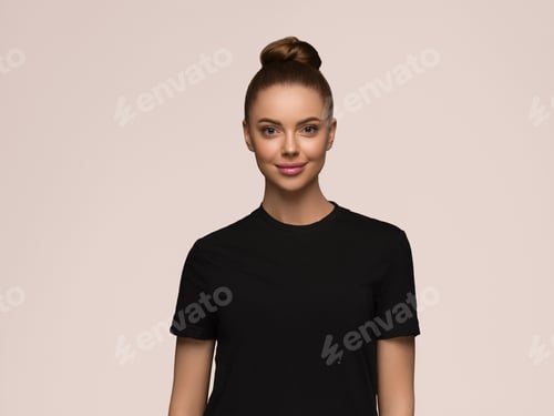 Preview: Young Woman Smiling in Black T-Shirt Headshot