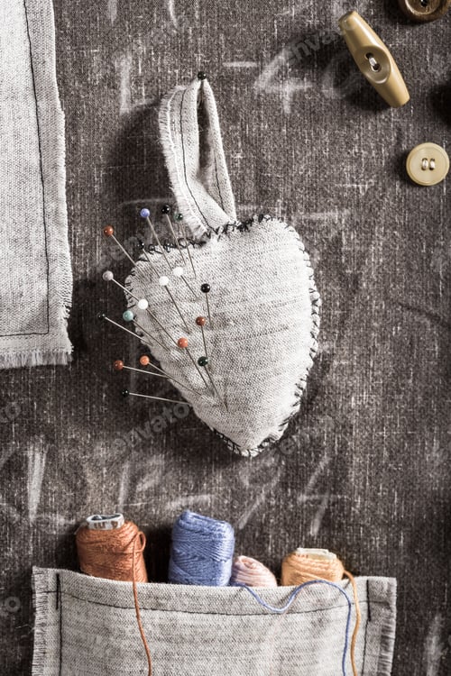 Preview: Handmade background with scissors, threads and needles in tailor workshop