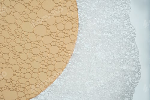 Preview: Fluffy white foam with orange glass that shows the structure of the product.