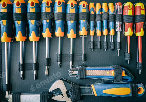 Preview: Screwdrivers set in a toolbox. DIY, maintenance service works concept, top view